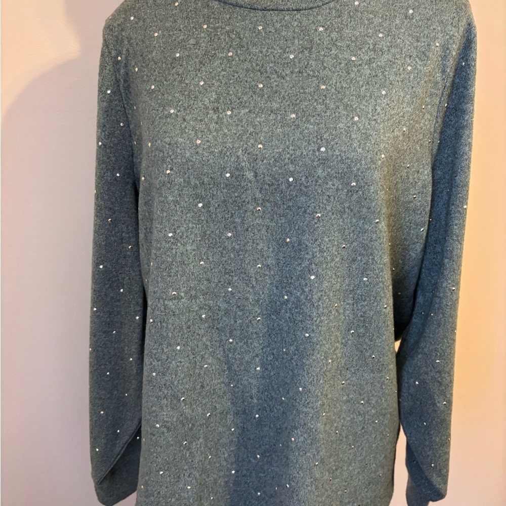 Emily Daniel’s Green Crewneck Sweater